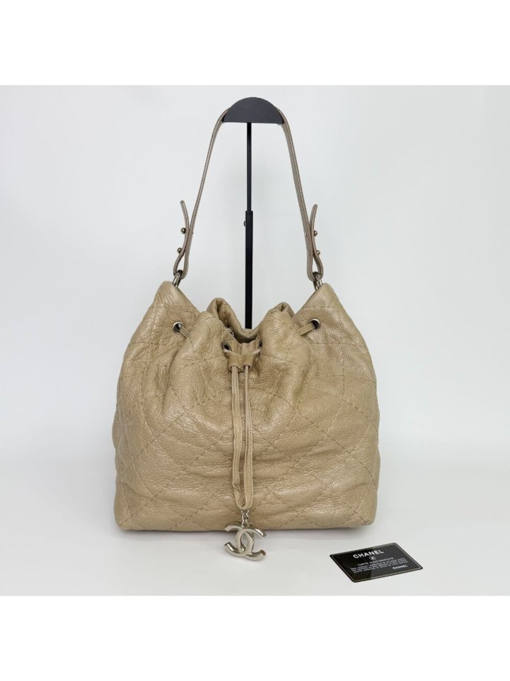 Chanel on the Road Quilted Bucket Shoulder Bag Leather Beige Silver Seal Vintage
